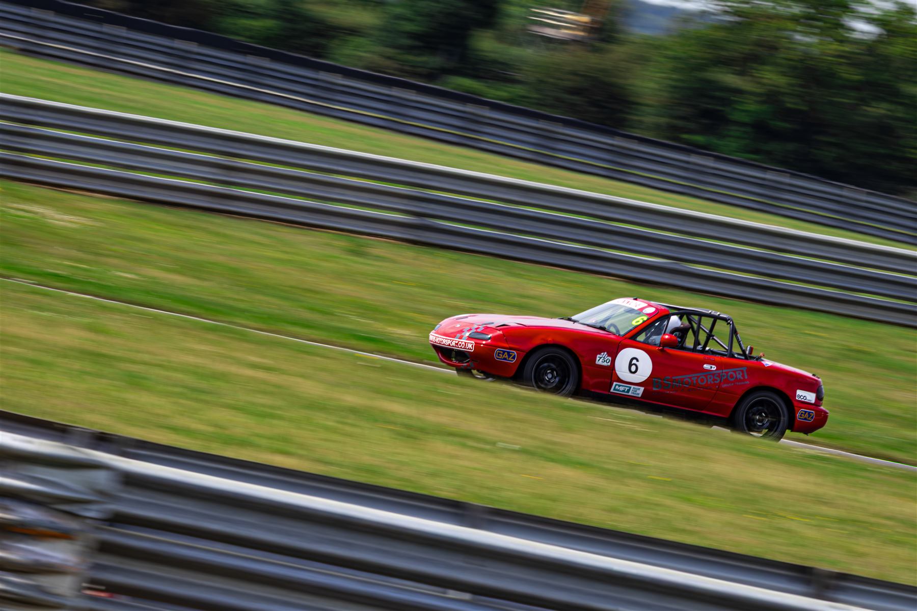 Christian Valverde's MX-5, car number 6, on track at Snetterton