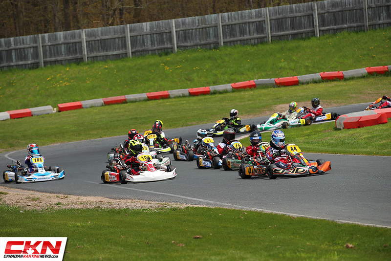 A grid of karts at the start of a Canadian karting race