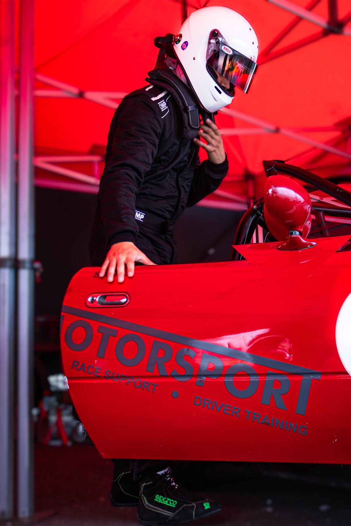 Christian Valverde suiting up ahead of a race at Snetterton