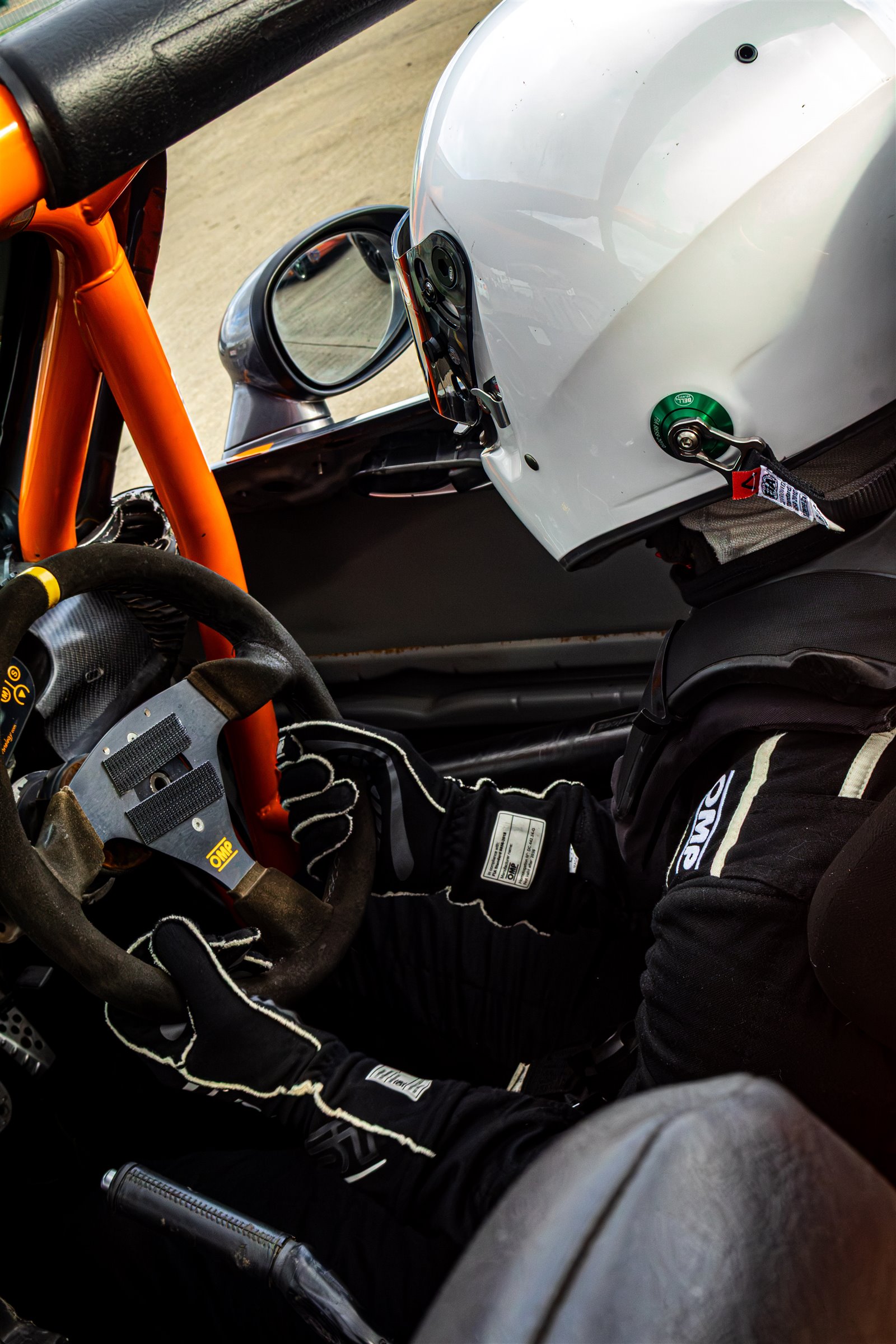 Christian Valverde's hands on the steering wheel