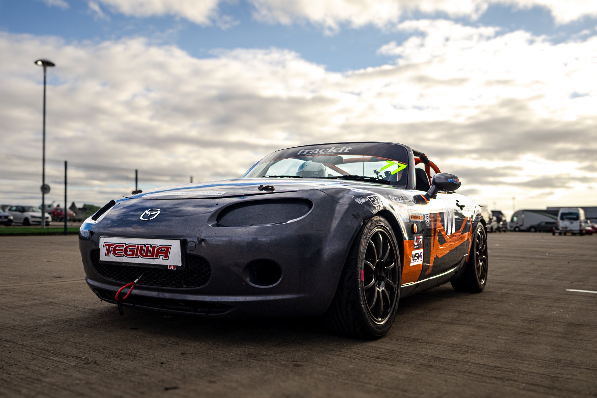 The MX-5 from the front, under a cloudy sky
