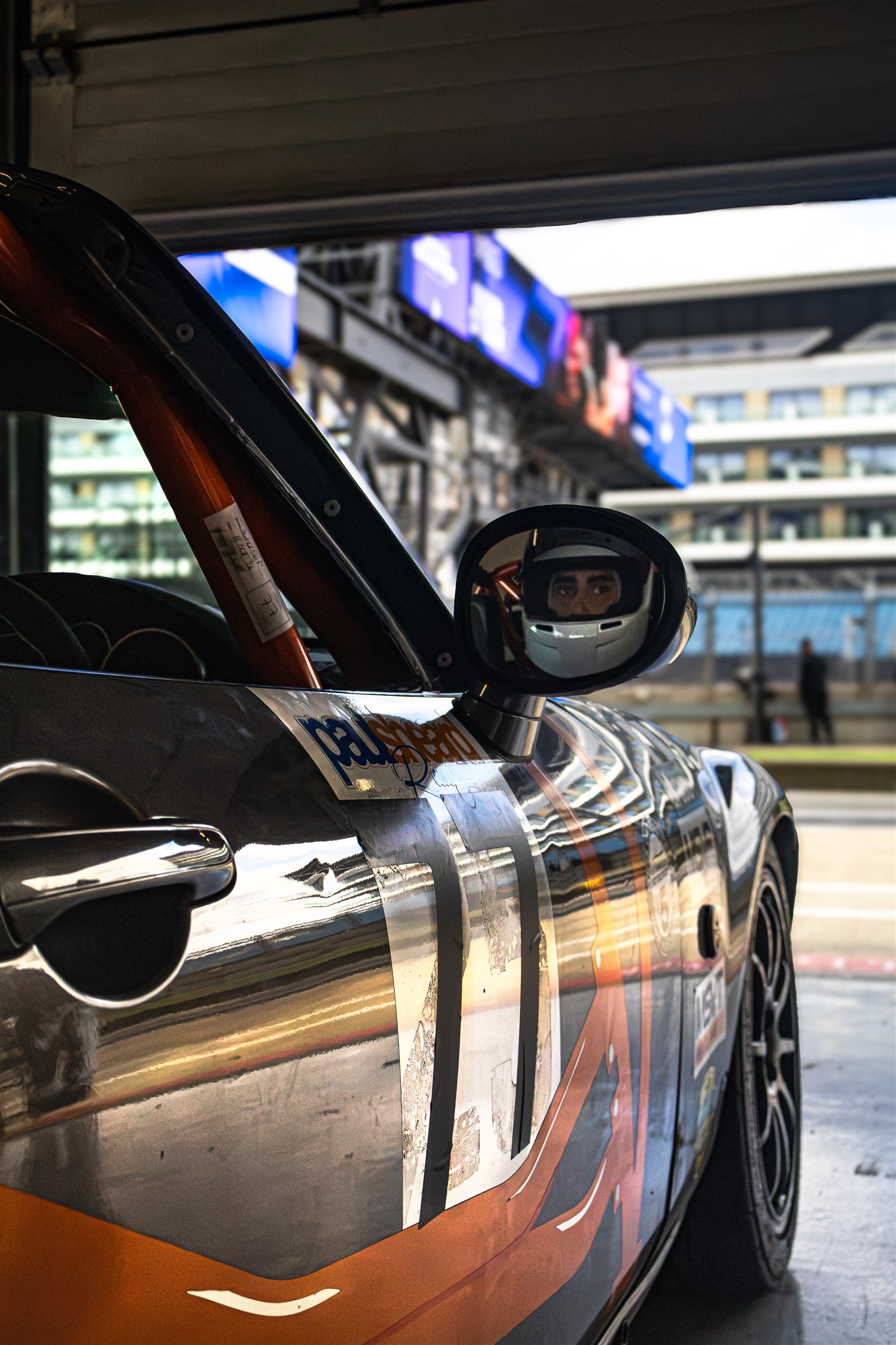 Christian Valverde reflected in the wing mirror of the MX-5